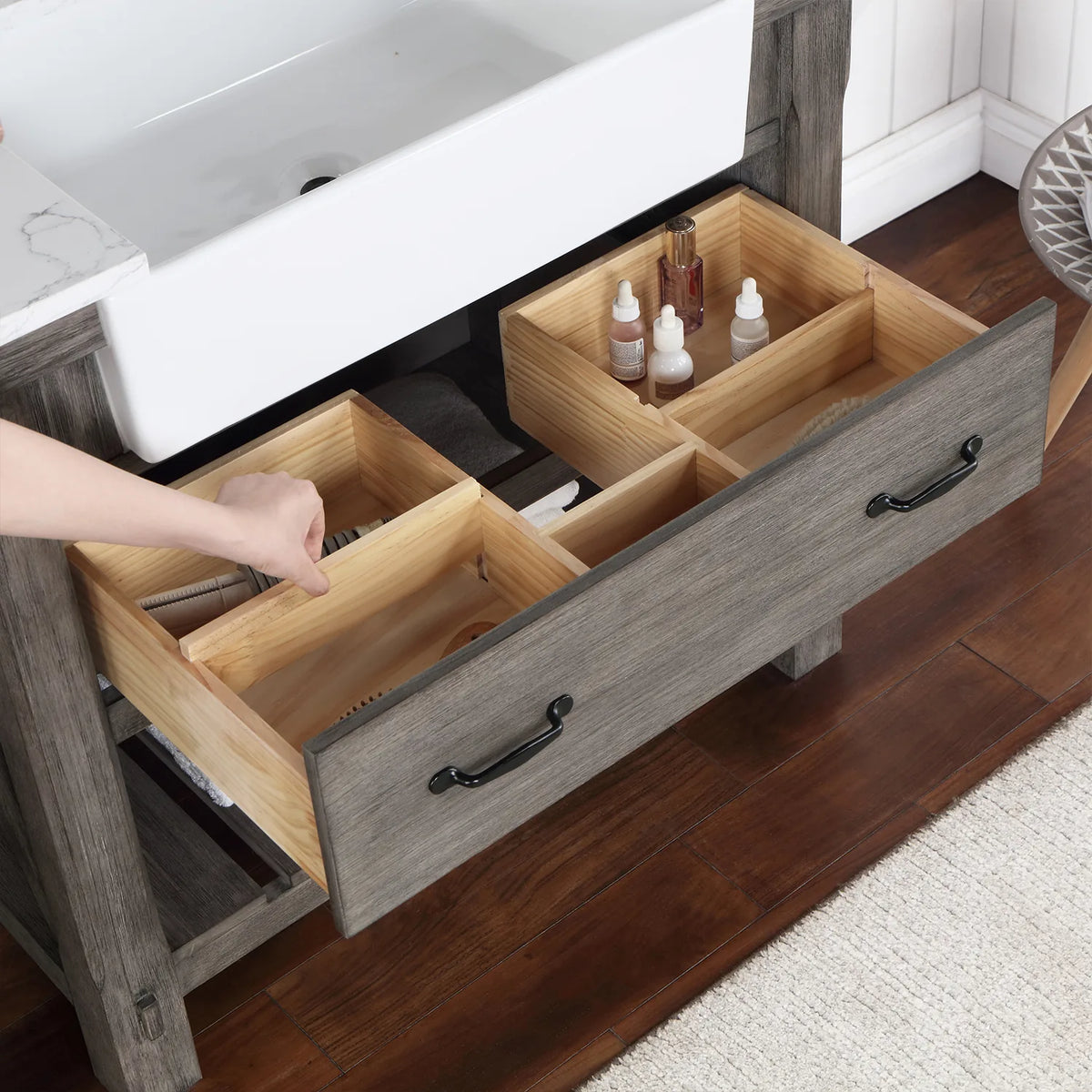 Drawer with movable wood dividers, hand in frame