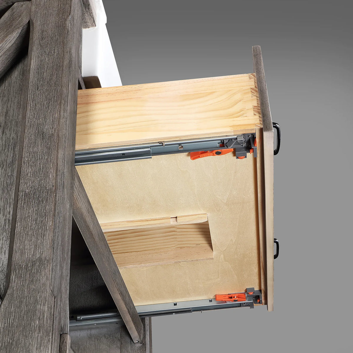 Full-extension drawer glide in close view with dovetailed wood box