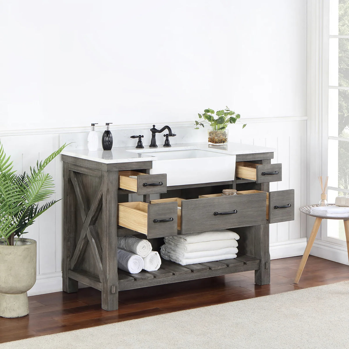 Center and side drawers open on the five-drawer 48 inch vanity