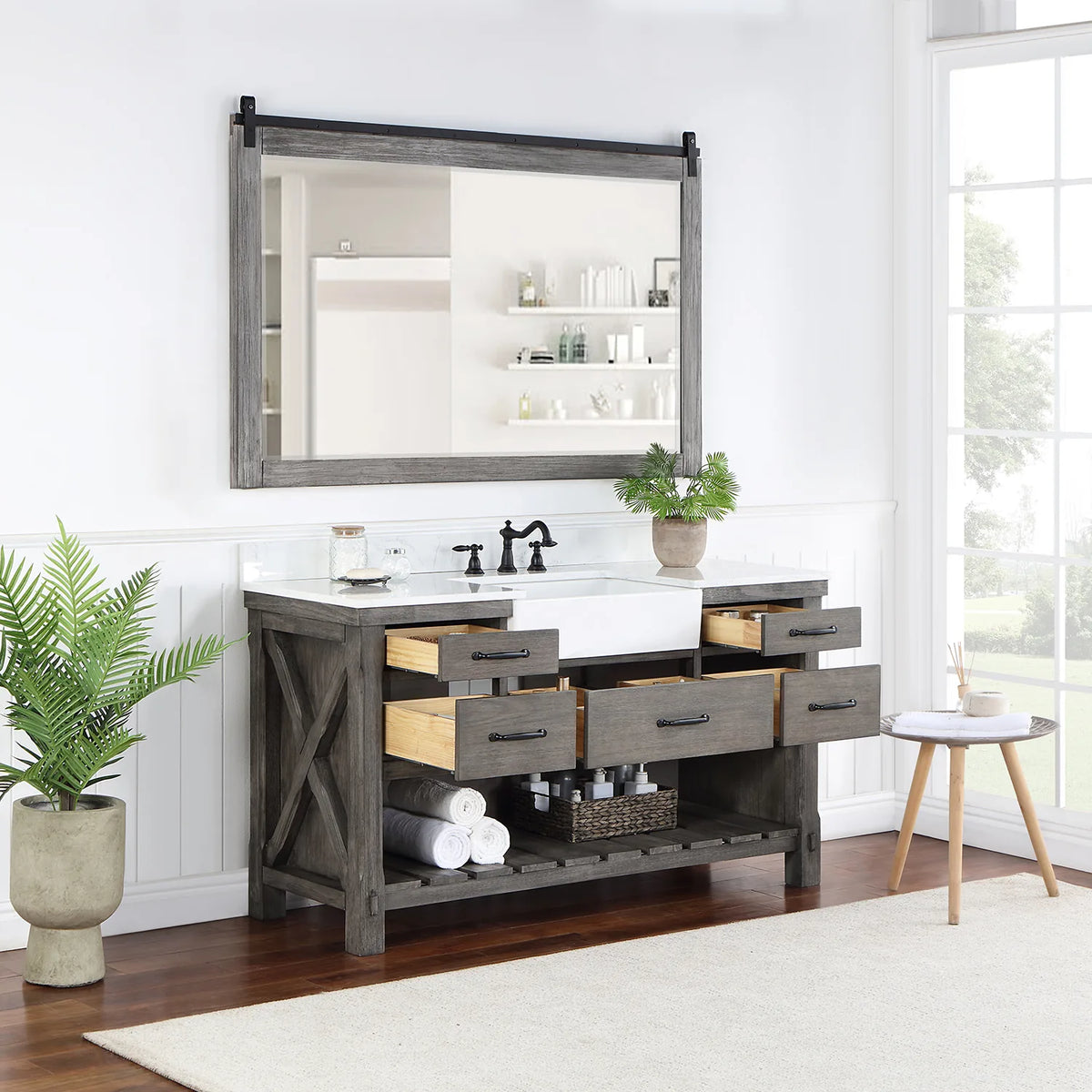 Mirror above the Classical Grey vanity while the center and side drawers stand open