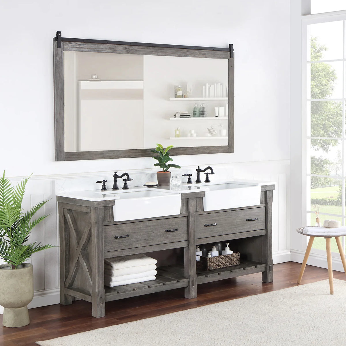 Styled bathroom with vanity, mirror, plant and towels on the slatted open shelving