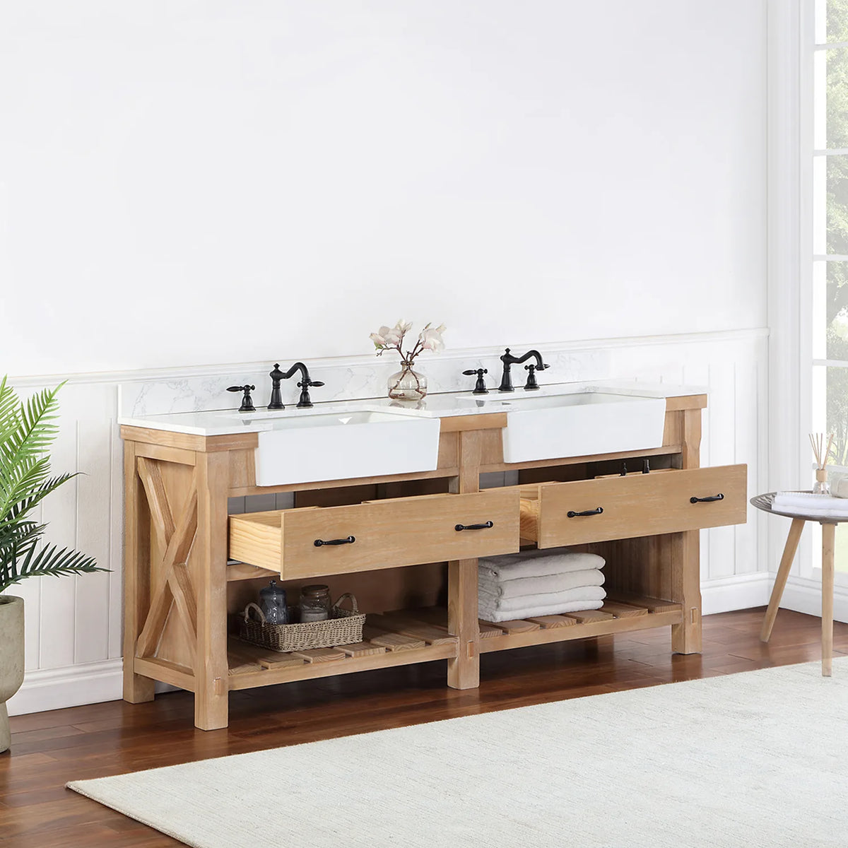 Drawers open on the double vanity, shelving and baskets visible underneath