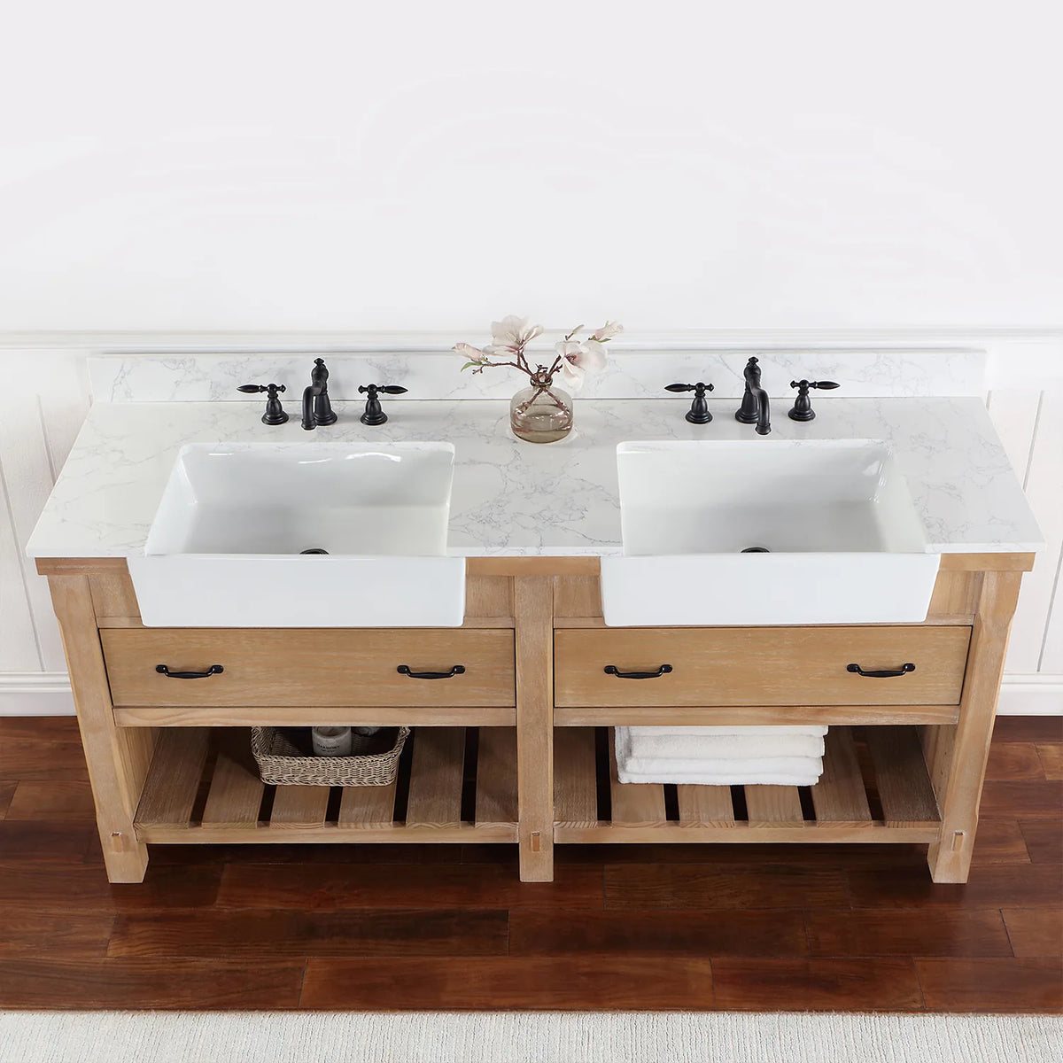 Overhead crop: stone surface with black pulls on the drawers below