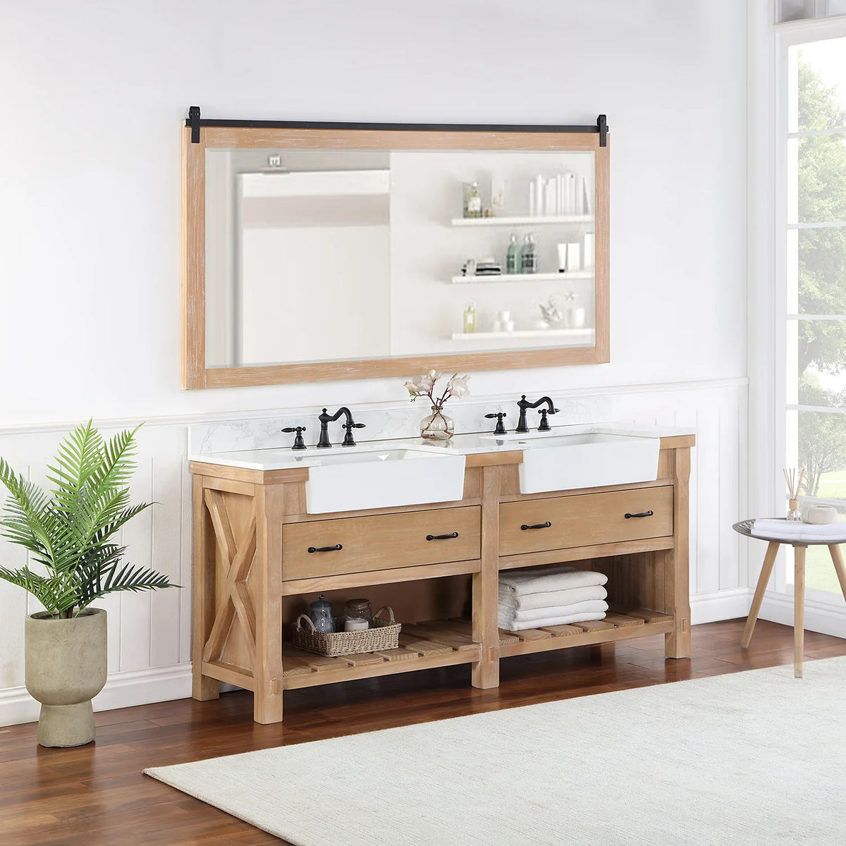 Styled bathroom with vanity, mirror, plant and towels on the slatted open shelving