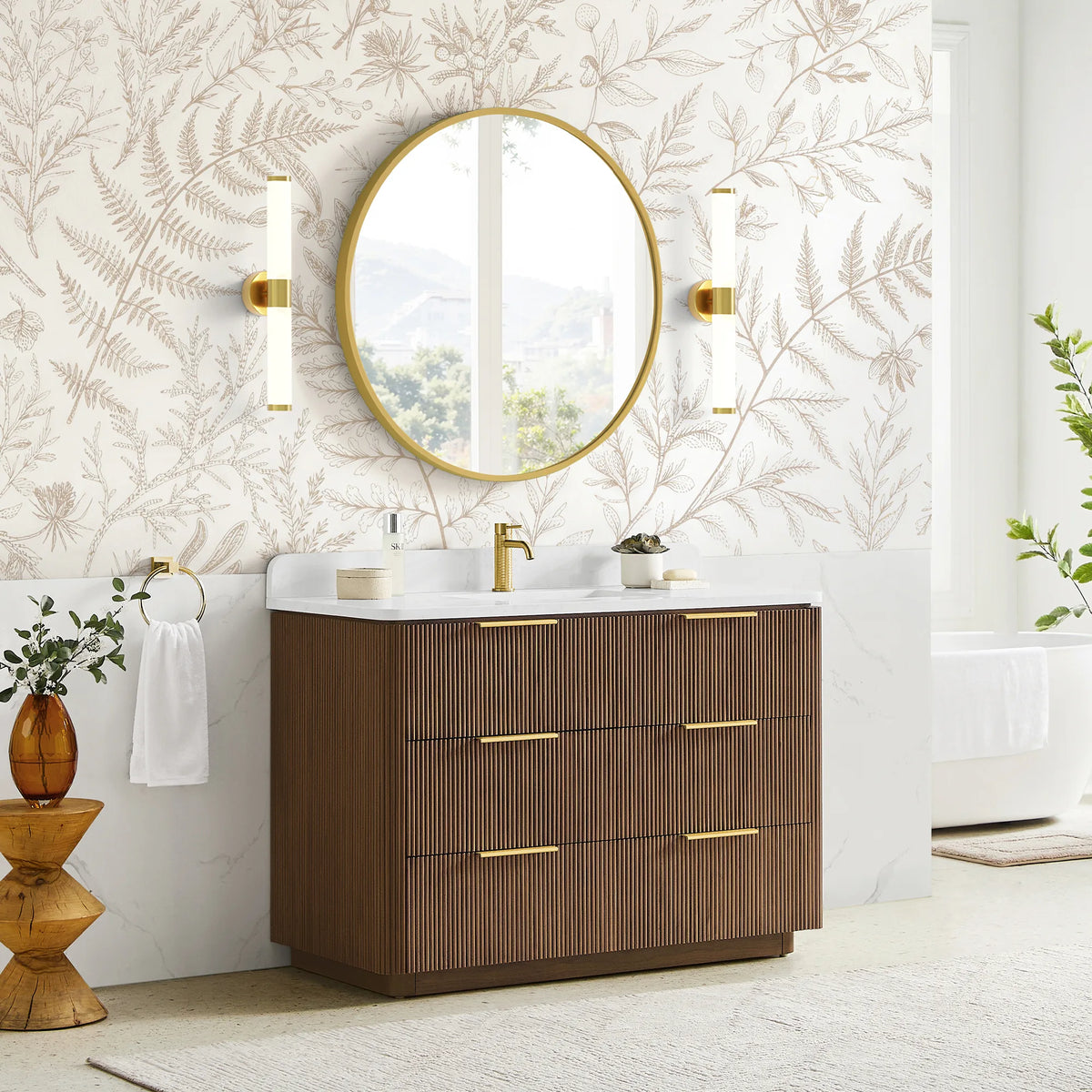 Angled room view of a 48 inch single sink vanity in Oak Light Walnut with brushed gold handles