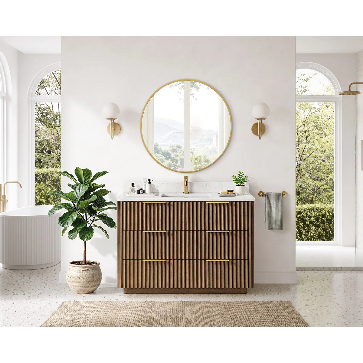 Full bathroom shot: single sink vanity in Oak Light Walnut, arched windows and a woven rug