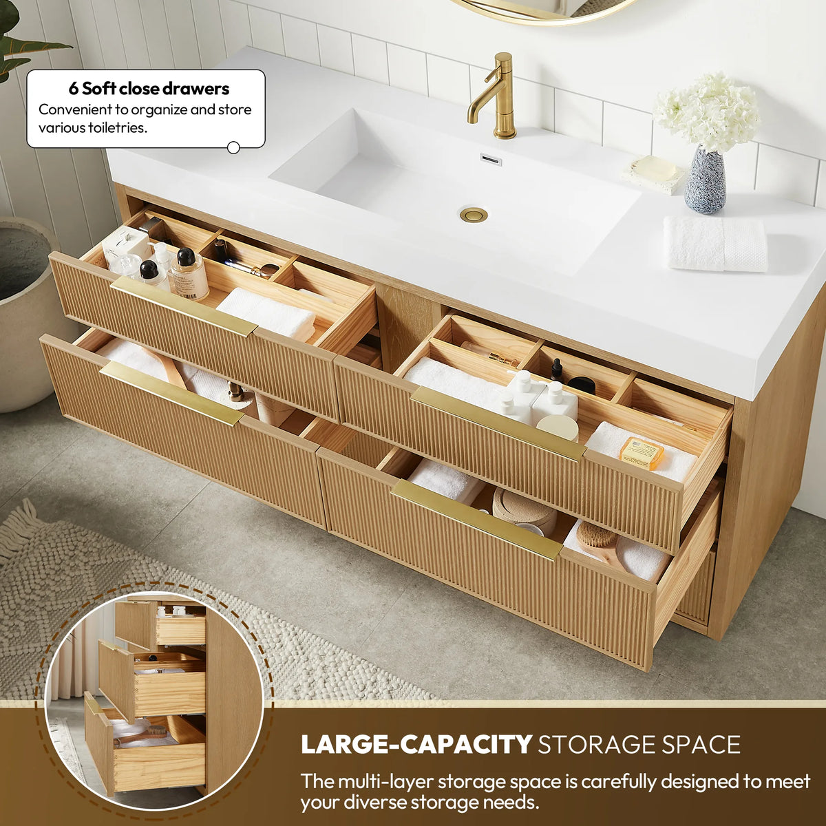 Open drawers on the 60-inch vanity, filled with bath items in wooden compartments, with an inset of stacked drawers
