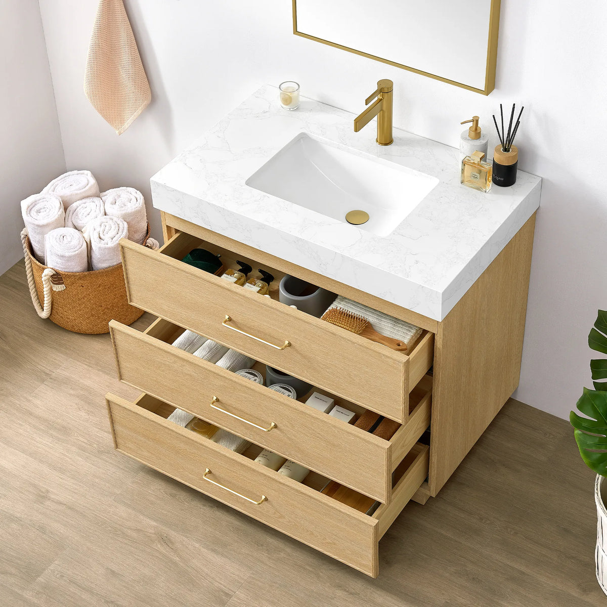 Angled view of the 36 inch vanity with every drawer open to show the interior space