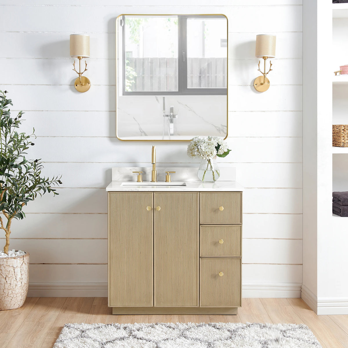 Bathroom scene with a 36-inch Dovessan single vanity finished in Aged Natural Oak