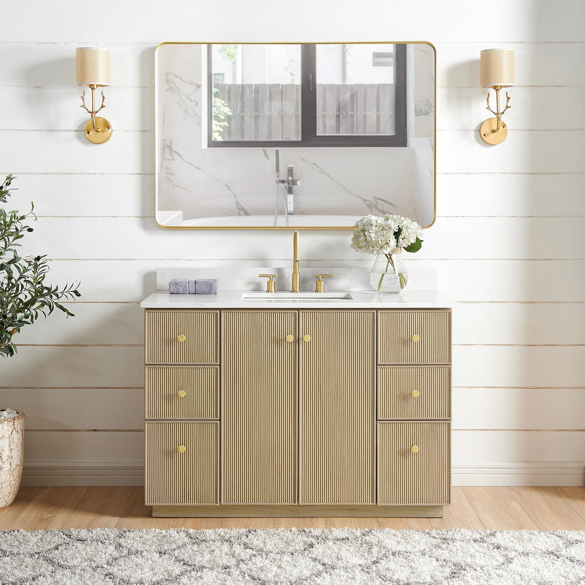 Bathroom scene with a 48-inch Dovessan single vanity finished in Aged Natural Oak