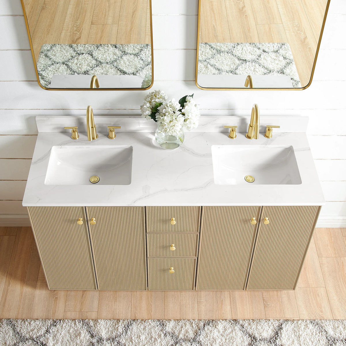 Top-down close view of the Calacatta White Quartz top and undermount sinks on the double vanity