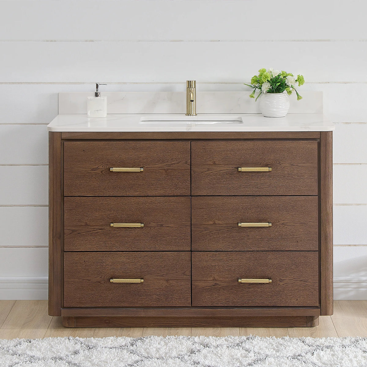 Front view of a 48 inch single vanity in Aged Dark Brown Oak, styled in a shiplap bathroom with brushed gold hardware