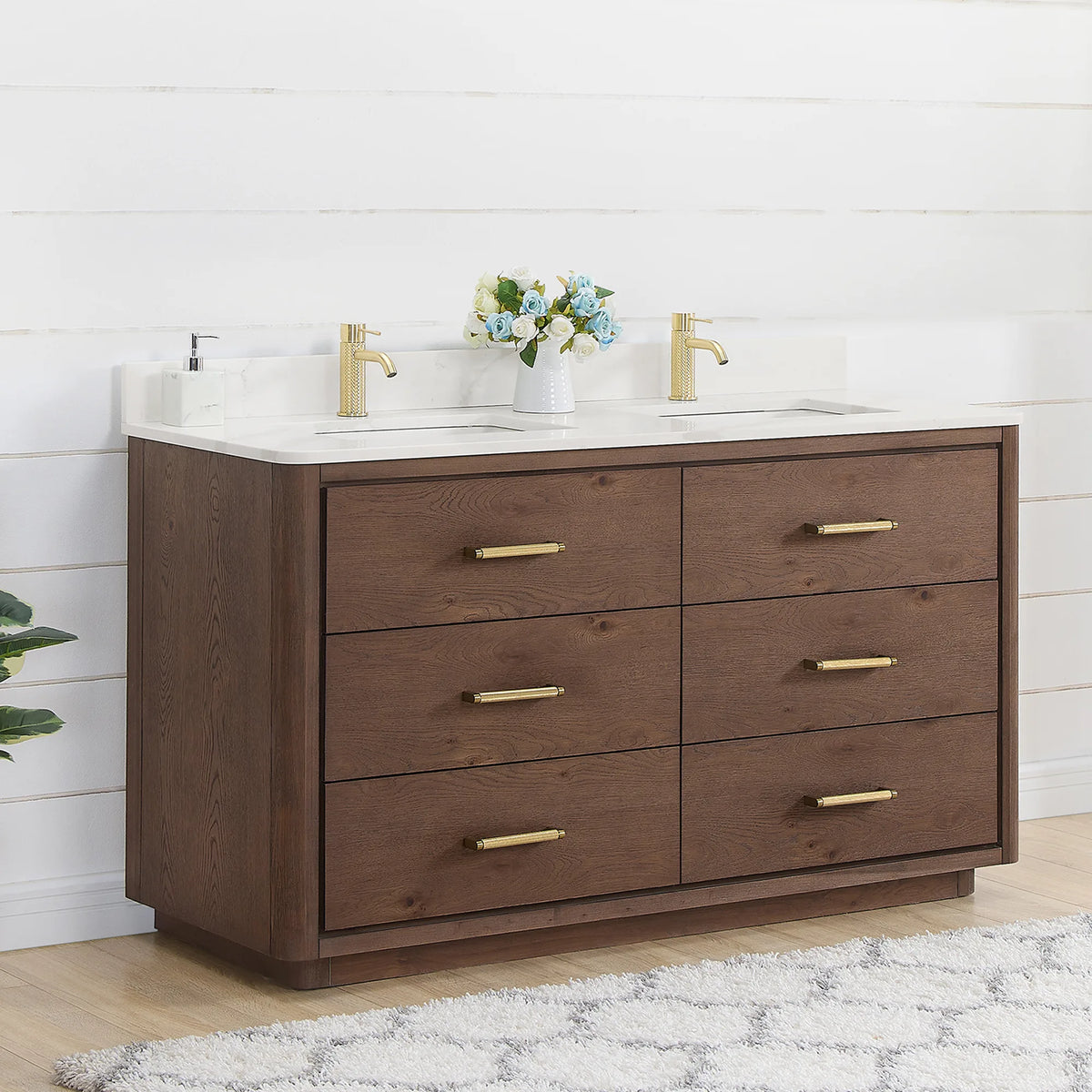 Angled room view of a 60 inch double vanity in Aged Dark Brown Oak with brushed gold pulls