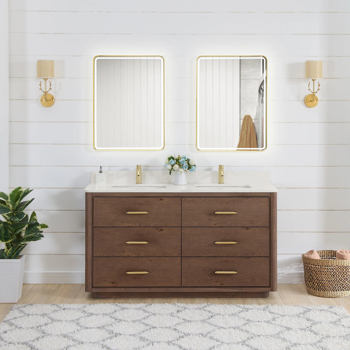 60 inch double vanity in Aged Dark Brown Oak with two LED mirrors, shown in a bathroom with gold wall sconces