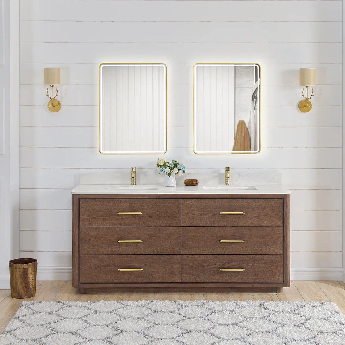 Room scene: Aged Dark Brown Oak double vanity, two LED mirrors lit above it and sconces at the sides