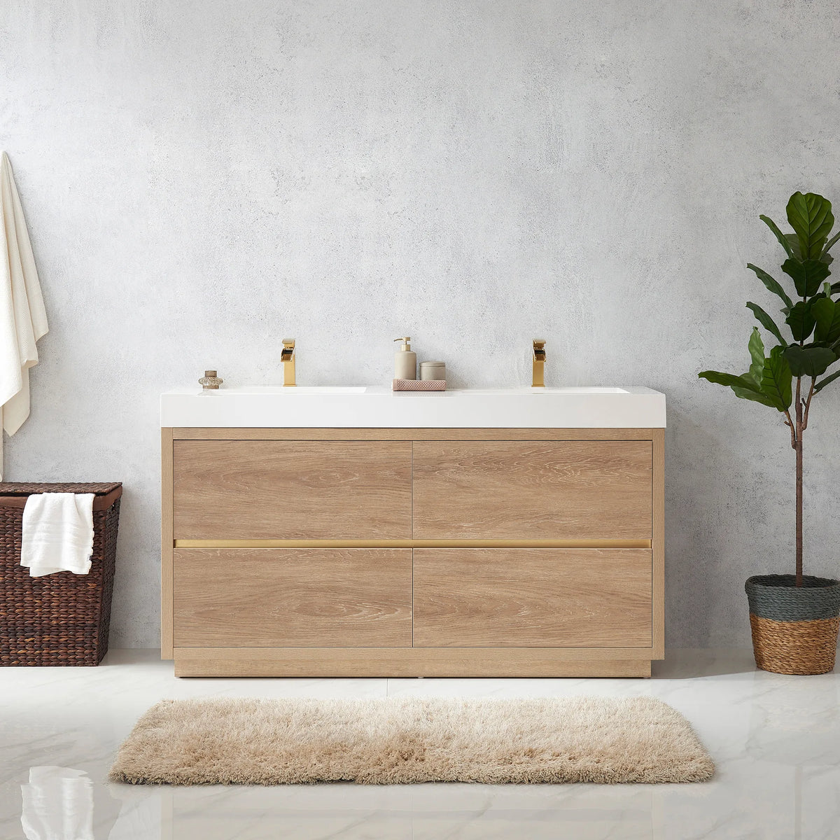 Cropped room view of the double vanity with a hamper at left, plant at right and a shag rug