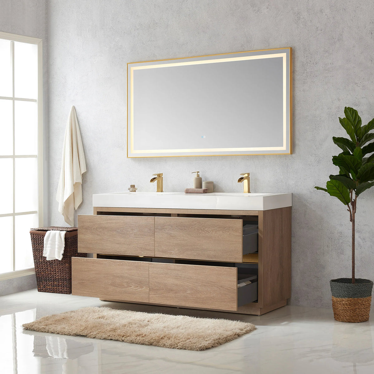 Double vanity with mirror above and drawers open, towel, hamper and plant in the room