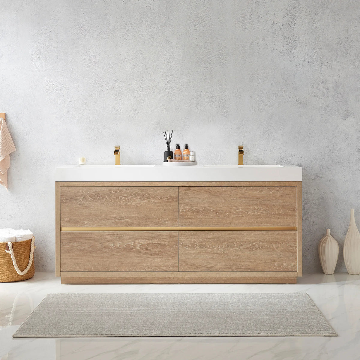 Medium shot of the double vanity with diffuser and bottles on top, vases at the sides, gray rug