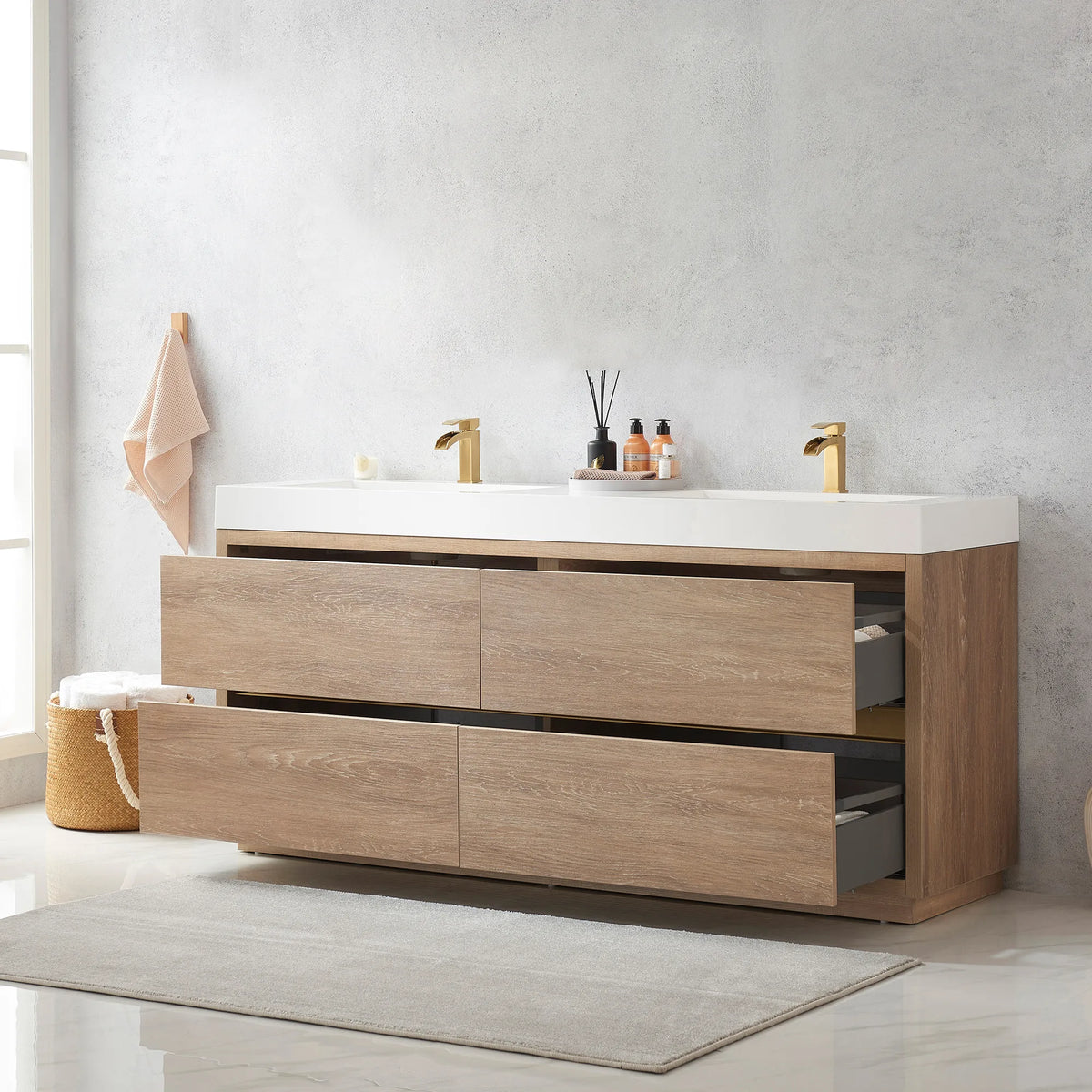 Double vanity with drawers pulled open, gray drawer interiors visible, towel basket and rug