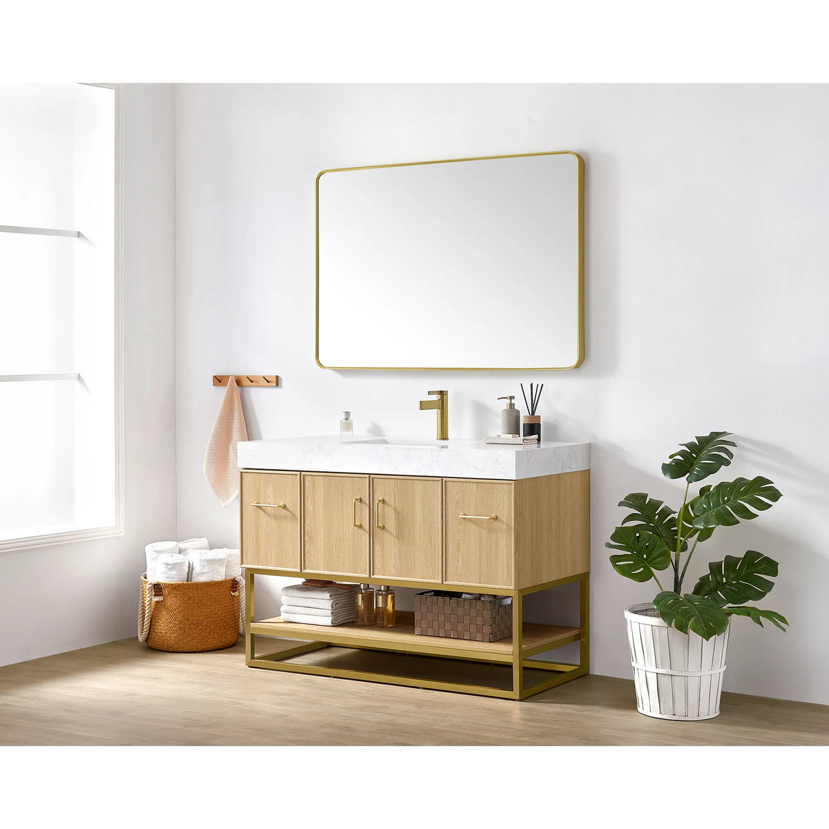 Window light on the 48 inch Dark Oak single vanity, with a brushed gold wall mirror above it