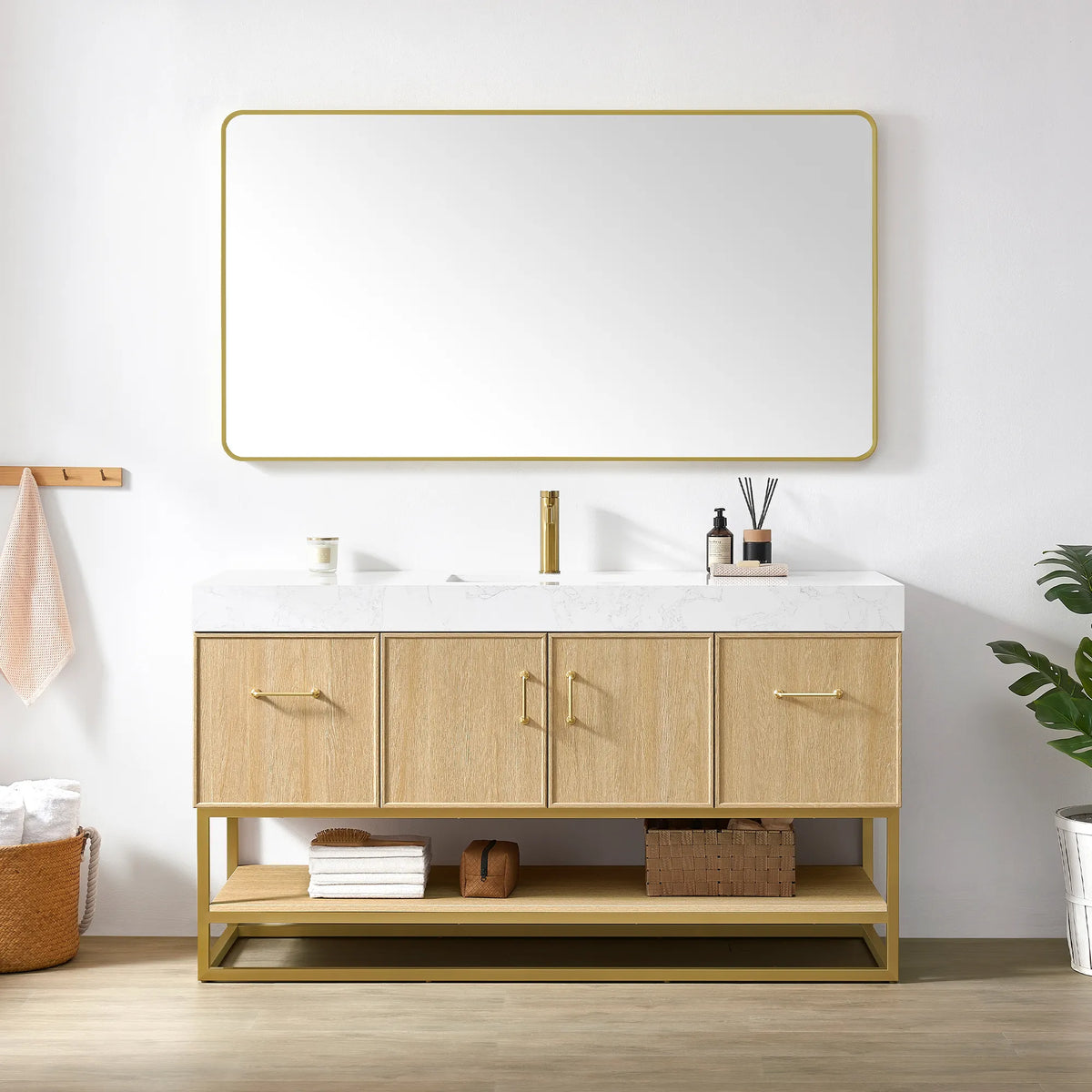 60 inch Dark Oak single vanity with a wide brushed gold wall mirror above it and towels on the open shelf