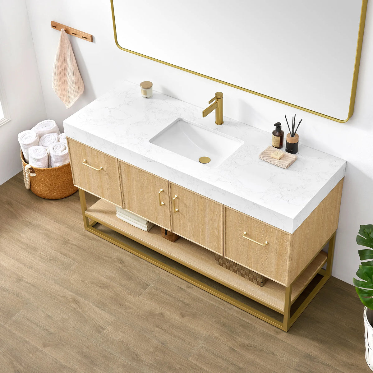 Close-up from above of the 60 inch Dark Oak vanity top, ceramic undermount basin and gold faucet