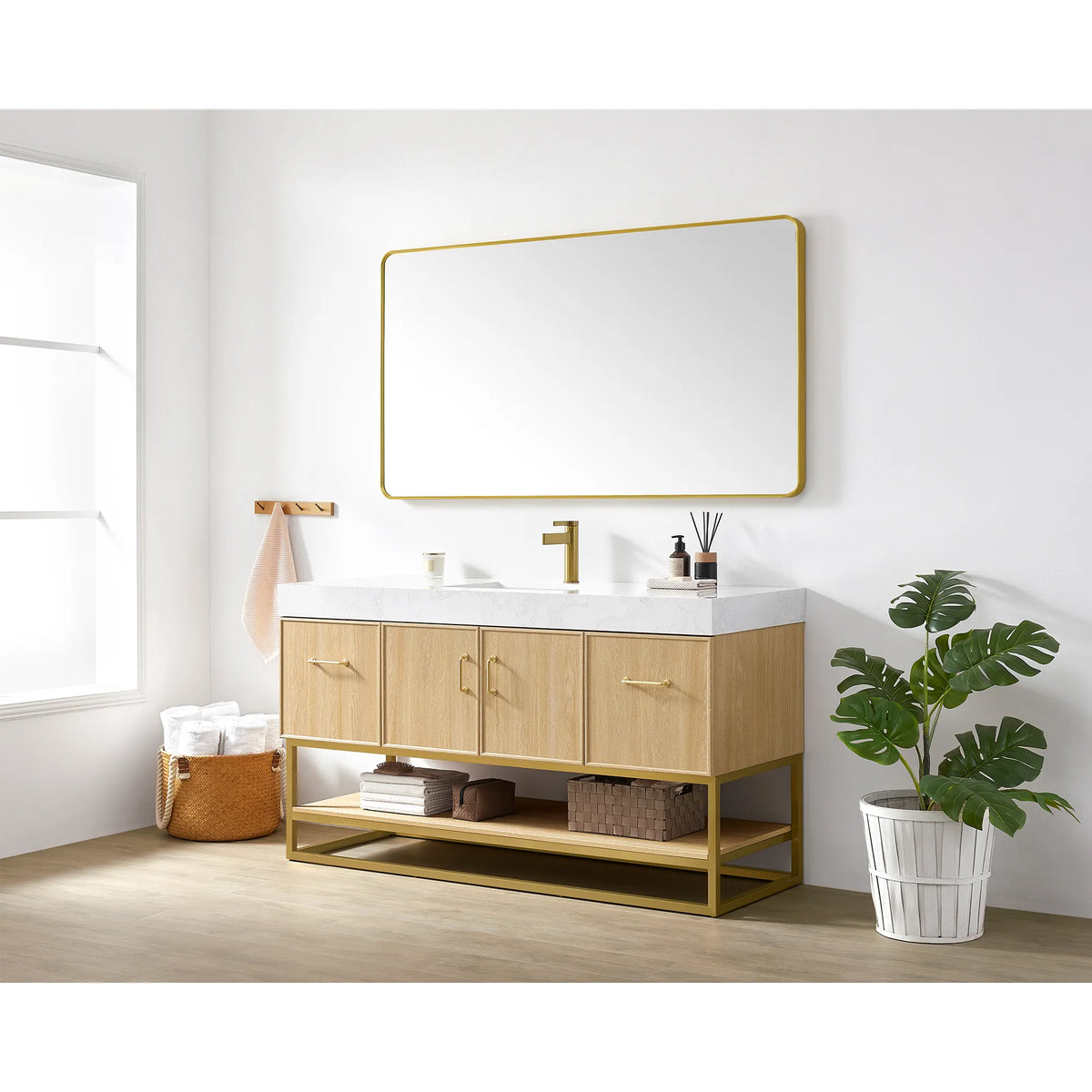60 inch Dark Oak single vanity by a window, towel basket and plant at the sides, brushed gold mirror overhead