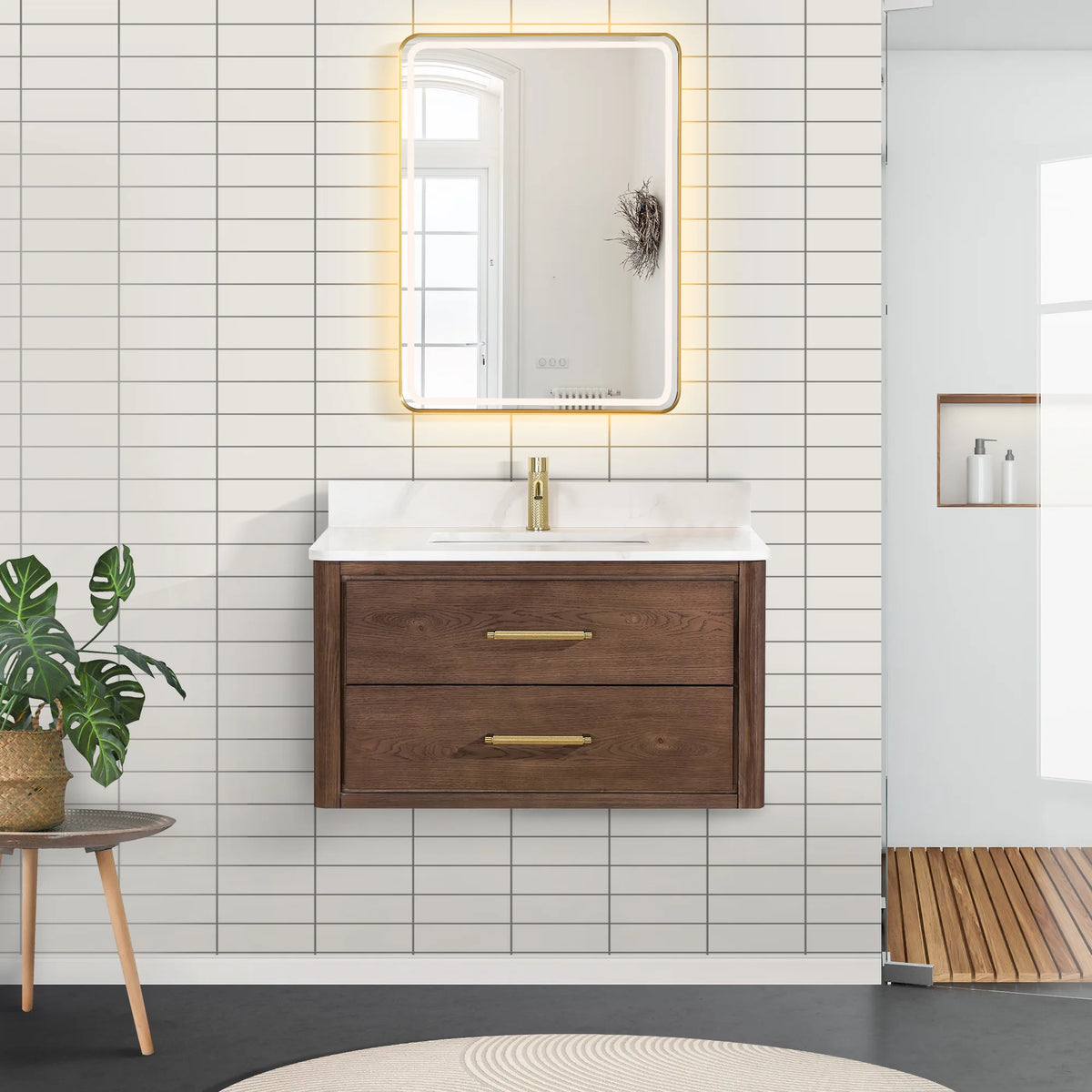 Bathroom scene: floating cabinet in Aged Dark Brown Oak with a lit mirror above and light tile behind, 36-inch model
