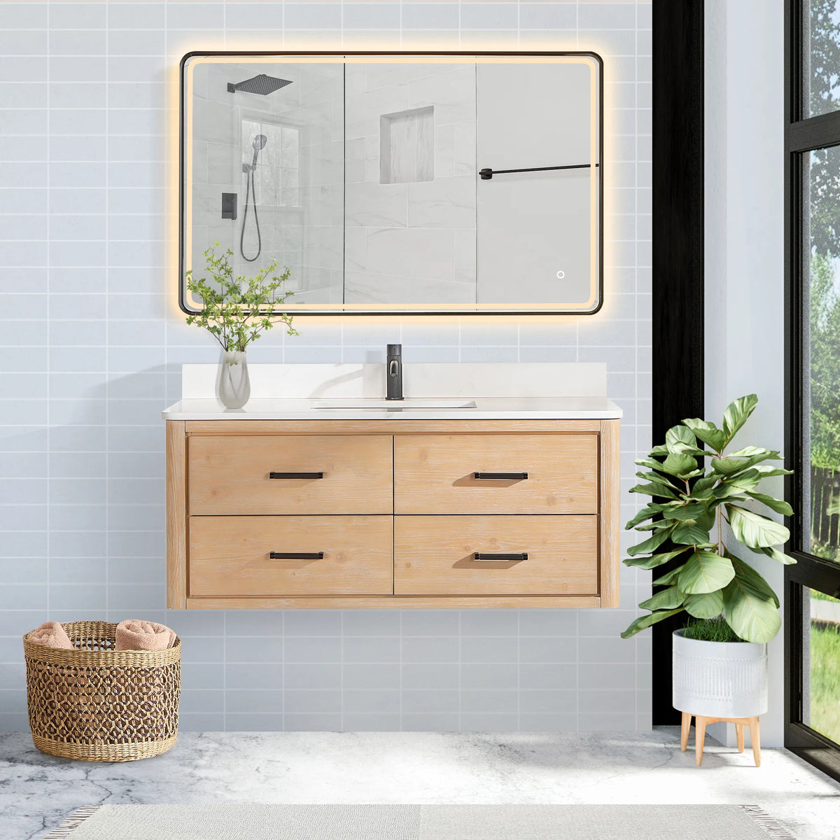 Bathroom scene: floating cabinet in Fir Wood Brown with a lit mirror above and a pale blue tile wall behind, 48-inch model