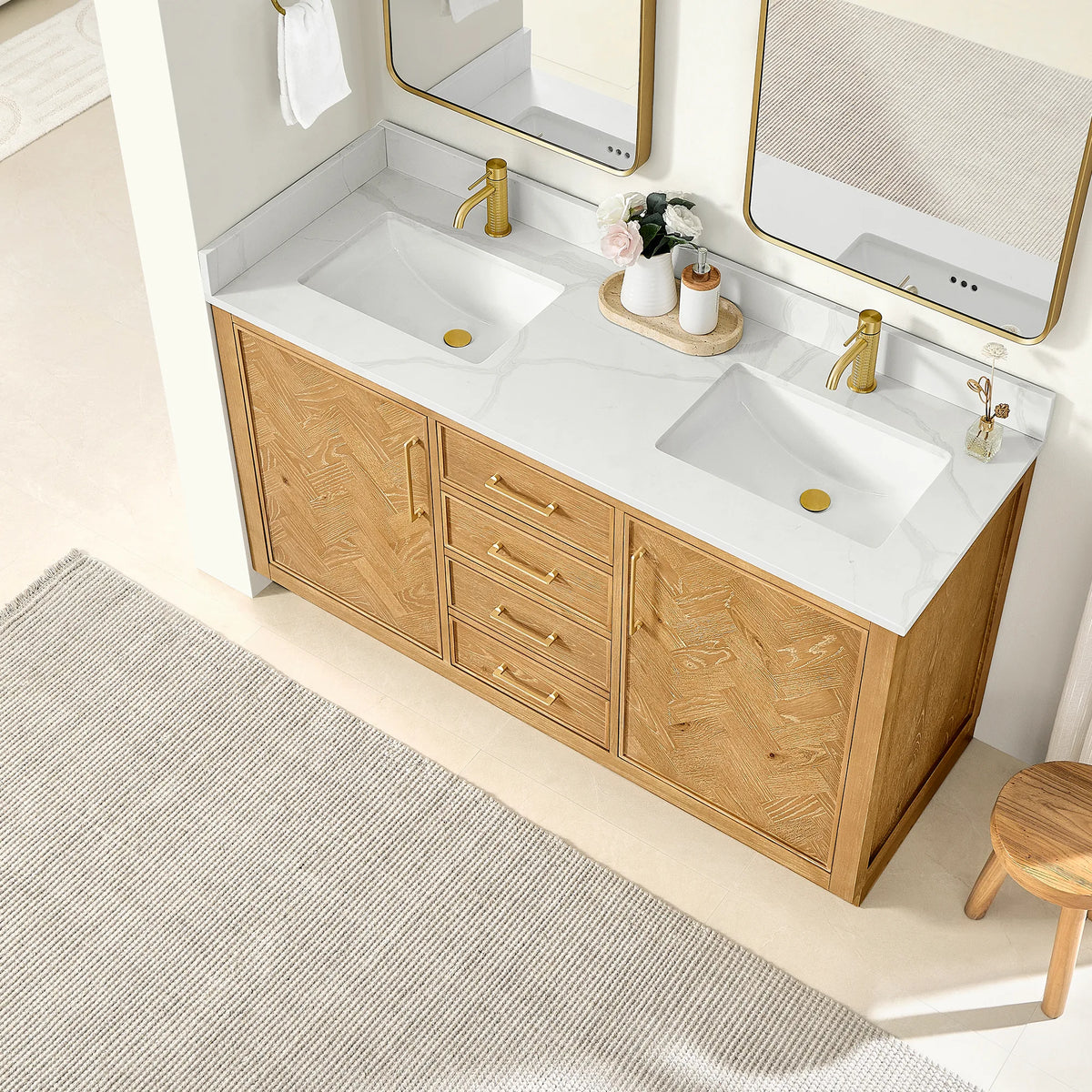 High-angle look at the 60-inch double, herringbone doors flanking a center drawer stack below a veined white top