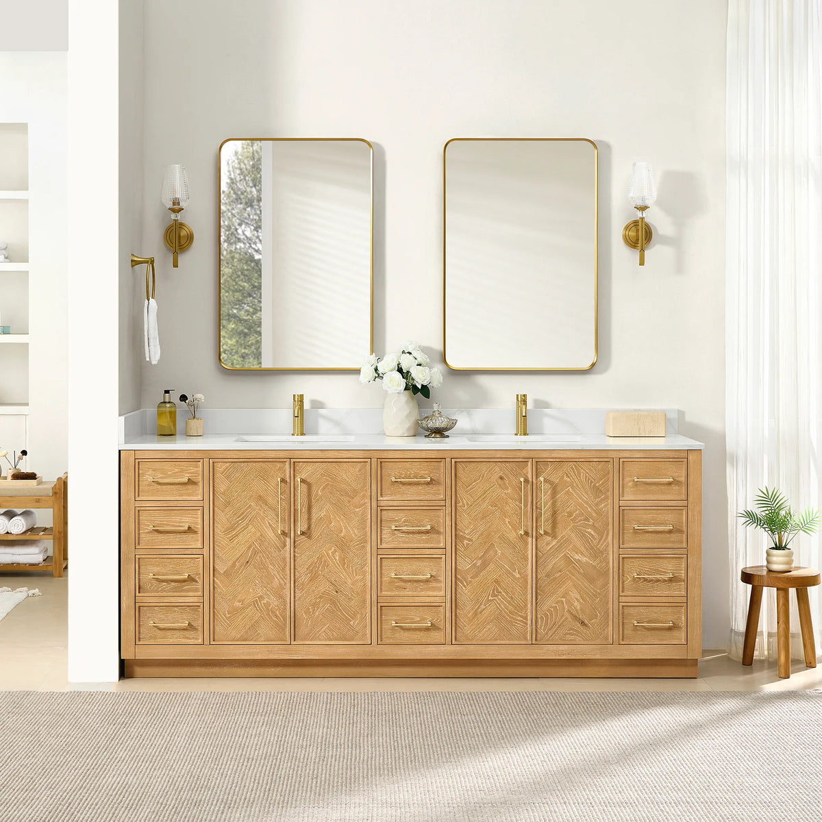 Bathroom scene with the 84-inch double vanity, its matching pair of mirrors and built-in shelves, plus a plant at the right
