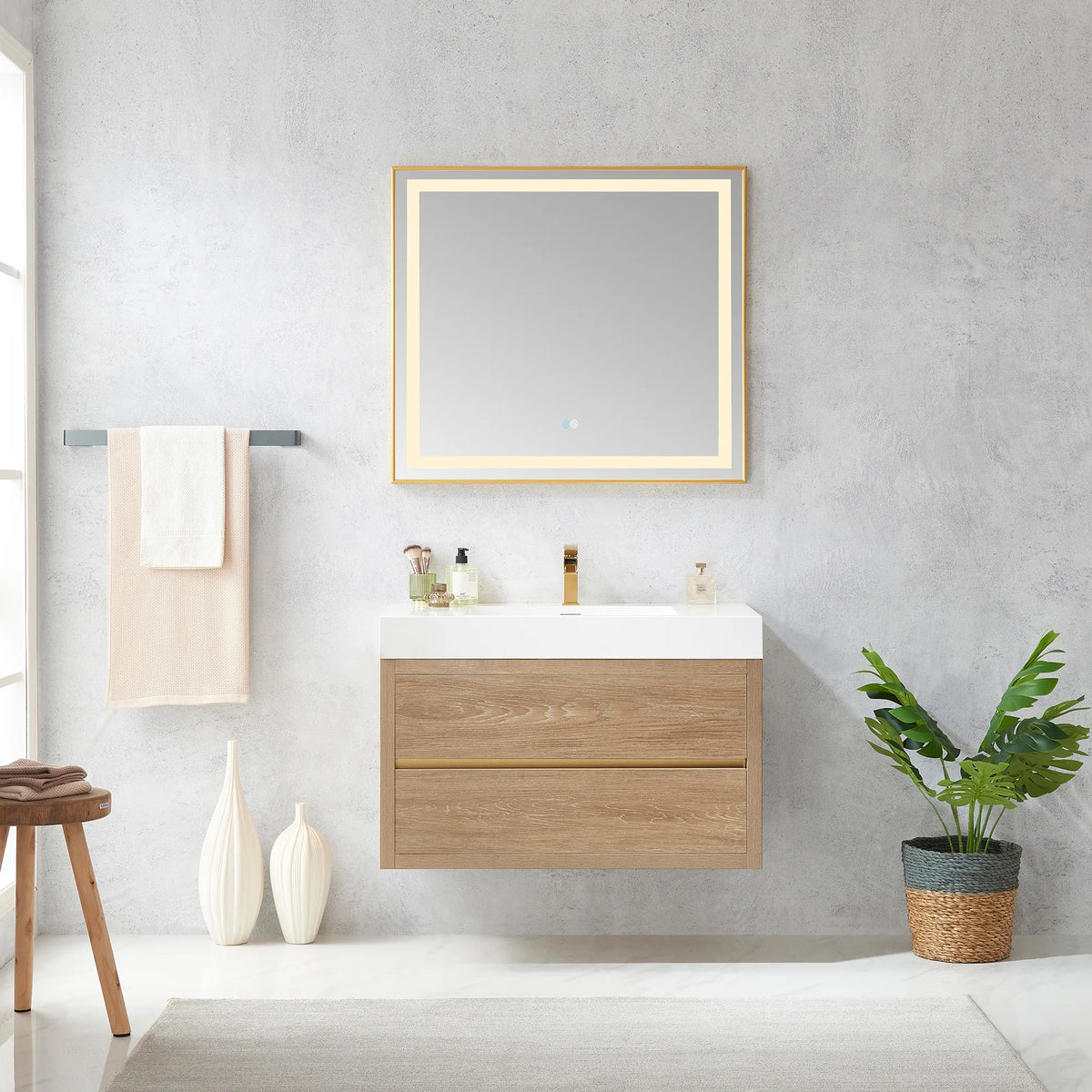 36 inch floating vanity in North American Oak below a rectangular LED mirror with a towel bar and potted plant