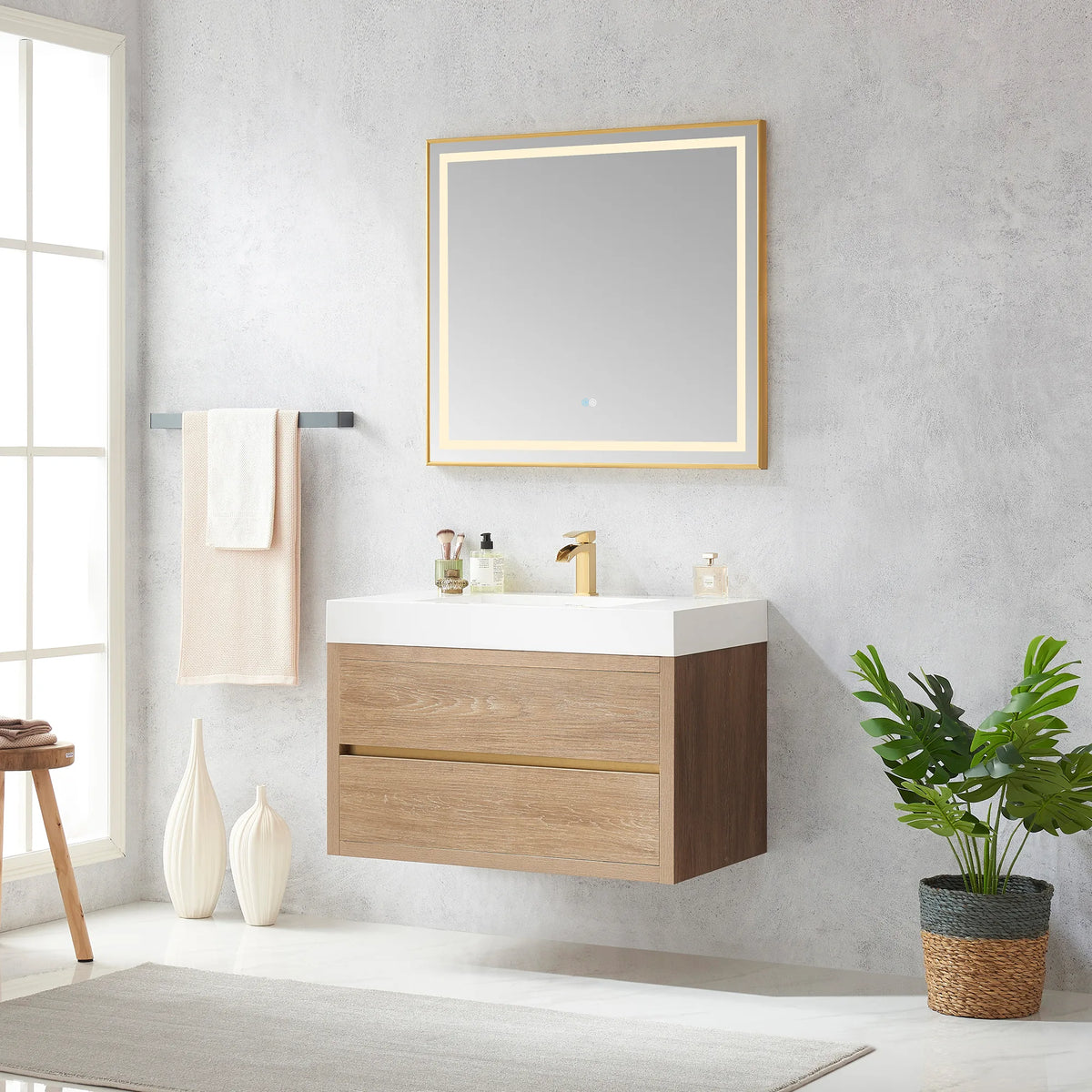 36 inch wall-mount vanity in a bright bathroom with a window, plant and wide mirror