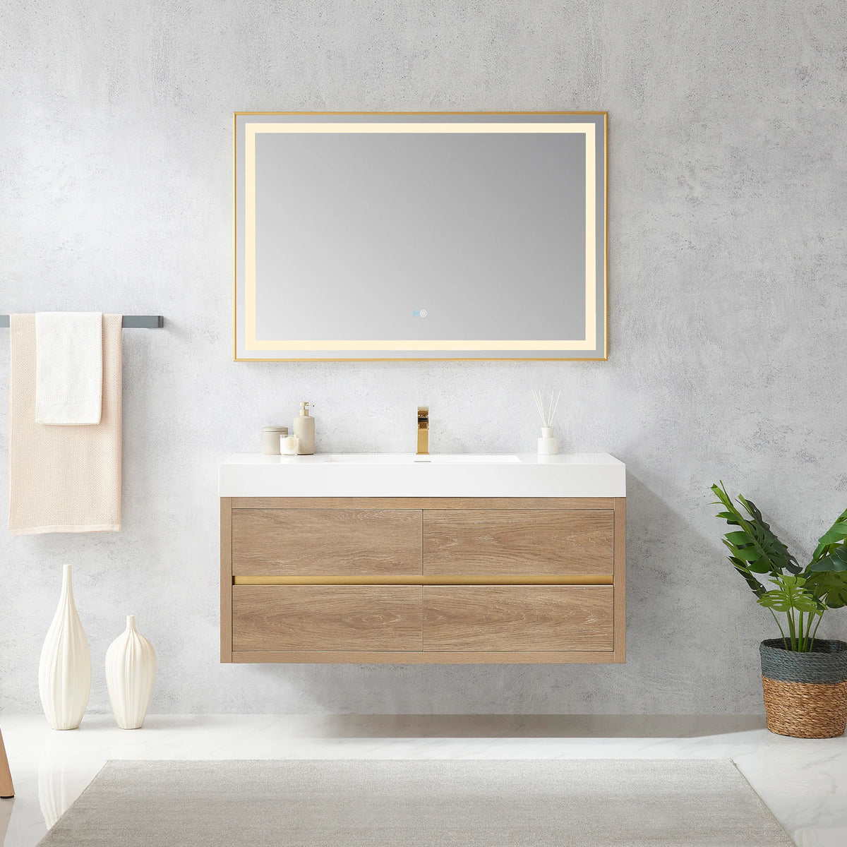 48 inch floating vanity in North American Oak below a rectangular LED mirror, towel bar and potted plant