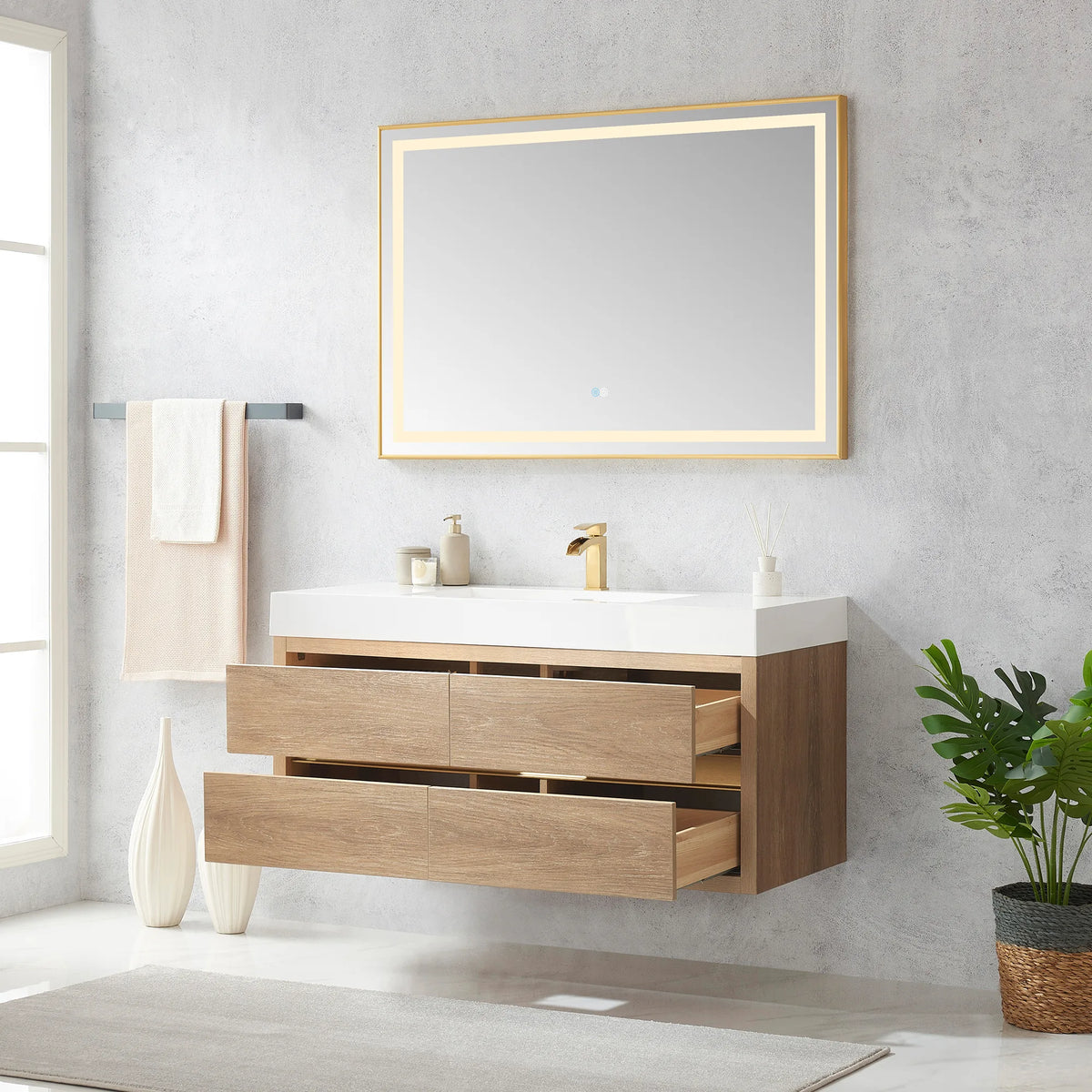 Open soft-close drawers on the 48 inch North American Oak vanity beneath the LED mirror