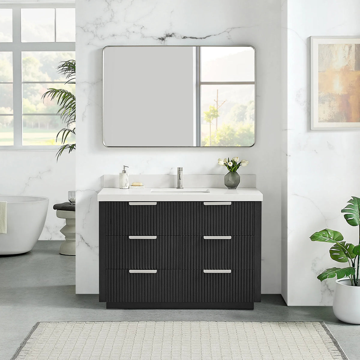 Wall mirror above the 48 inch Oak Weathered Black single vanity, quartz top and six drawers in a bright bathroom