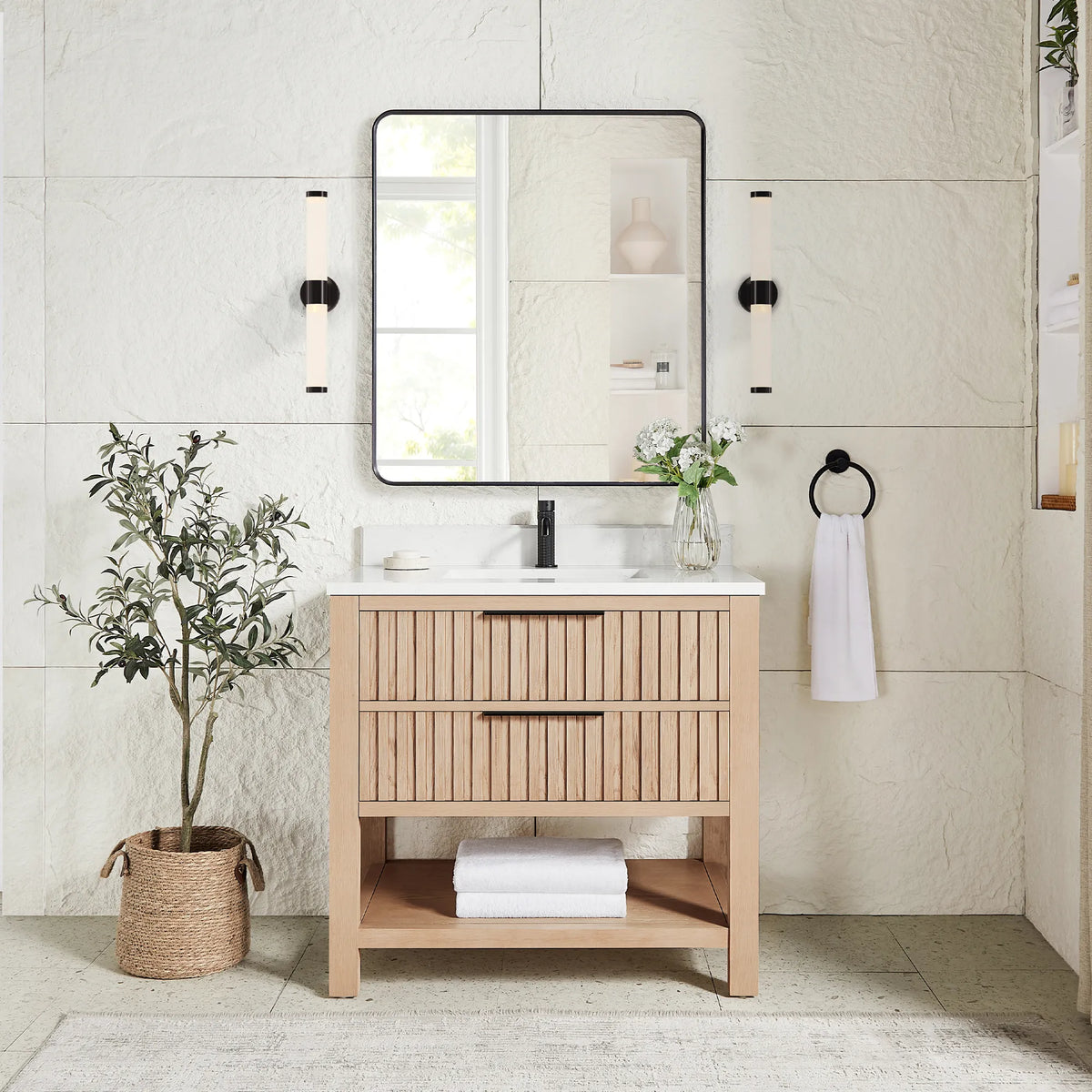 Staged room pairing a matching rectangular mirror in a black frame with the 36-inch vanity in Aged Natural Oak