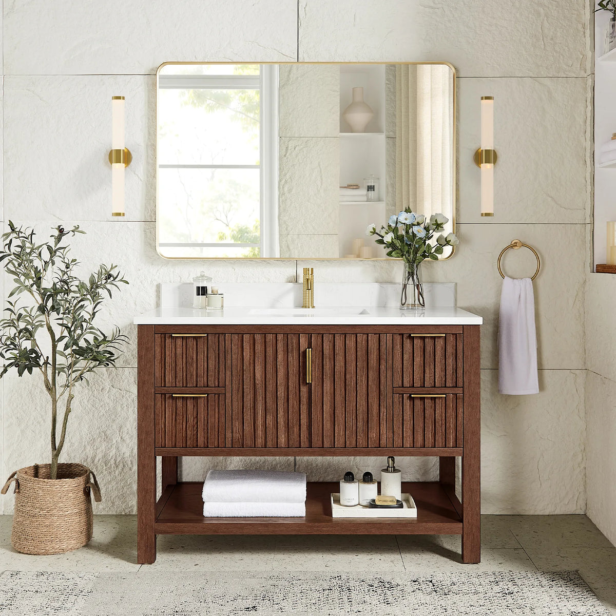 Matching rectangular mirror in a gold frame hung over the 48-inch Aged Dark Brown Oak cabinet