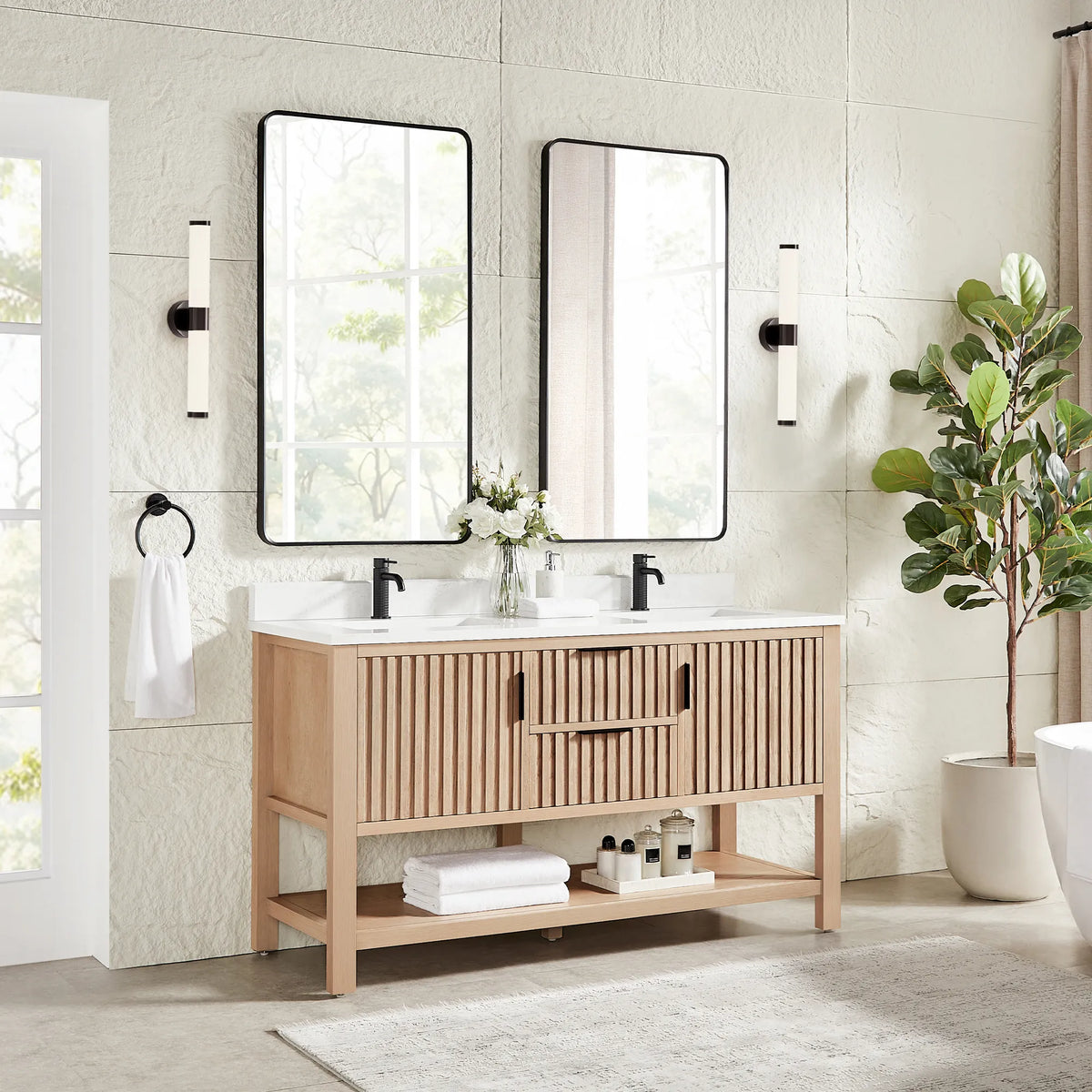Second angle: 60-inch cabinet in Aged Natural Oak with two rectangular mirrors in black frames and a plant