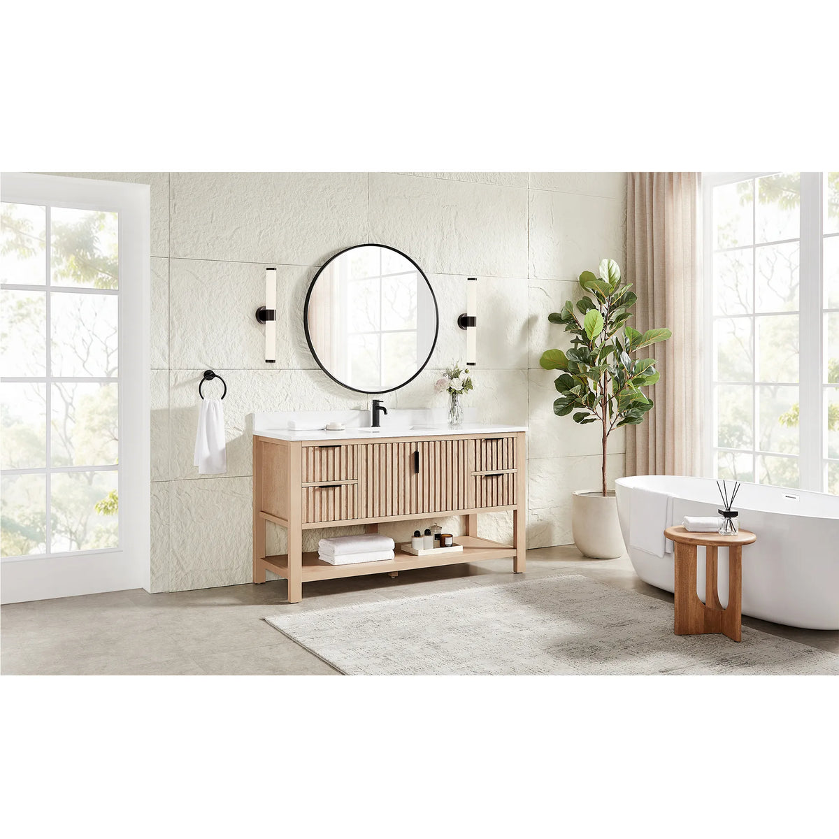 Wide room shot with a tub and window light behind the 60-inch Aged Natural Oak single vanity