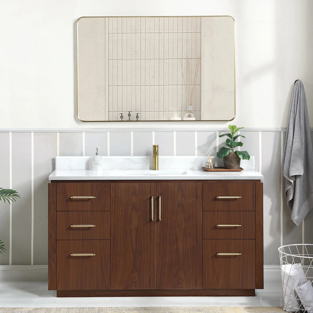 Room scene with a 60 inch vanity, a wide horizontal mirror, a wire basket at the right and a leafy plant at the left