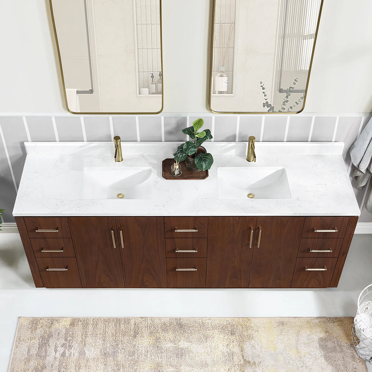 Top view of the undermount sink area and stone top with the double vanity drawers below