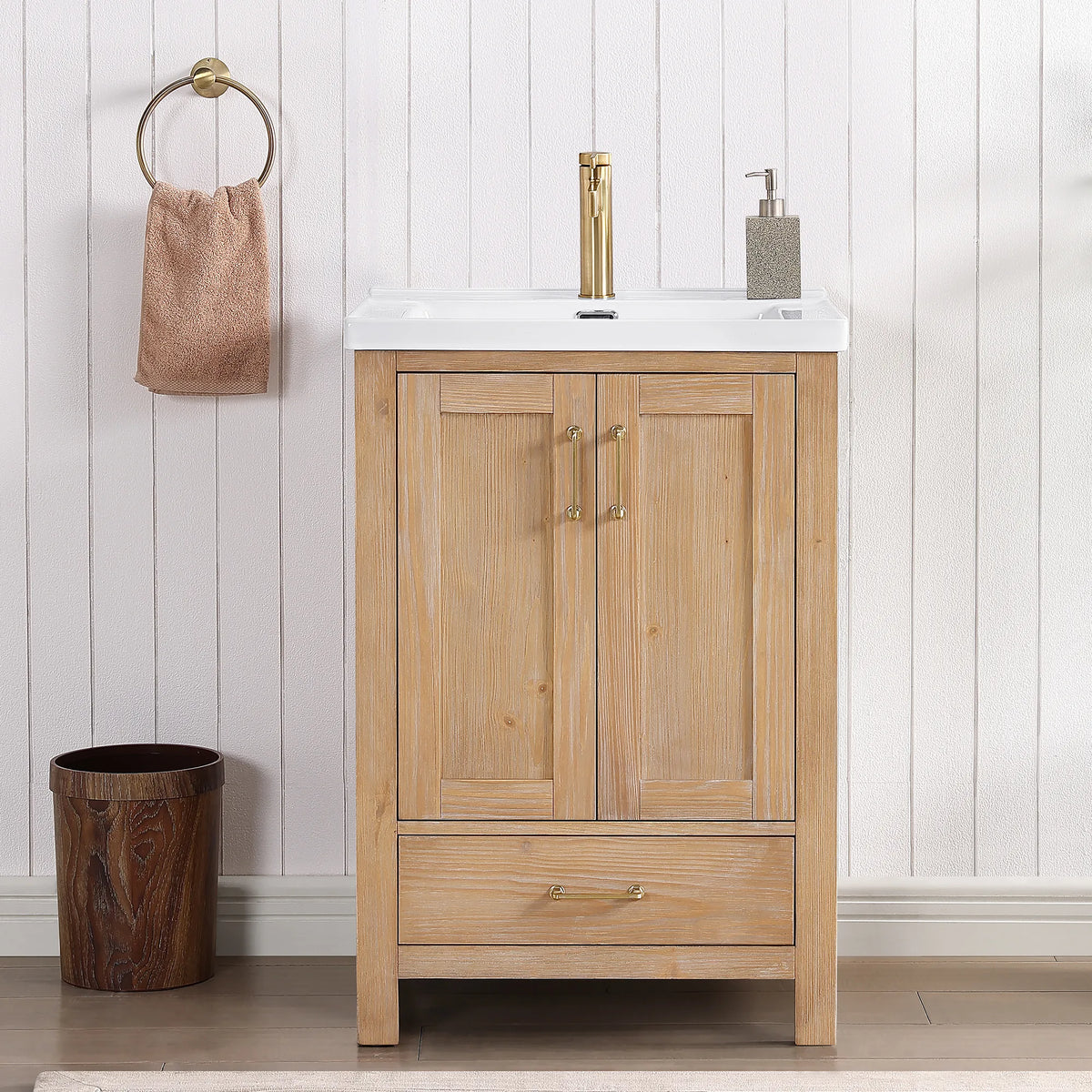 Bright bathroom with white slat wall, towel ring and gold faucet beside the Fir Wood Brown vanity