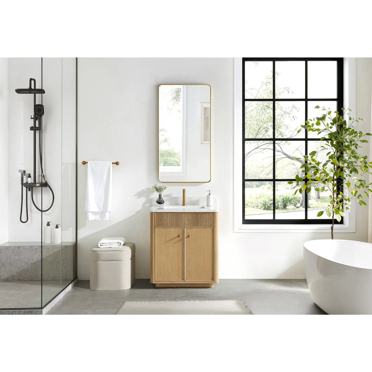 Full room setting for the 30 inch vanity in Washed Ash Grey, a glass shower on one side and a tub on the other