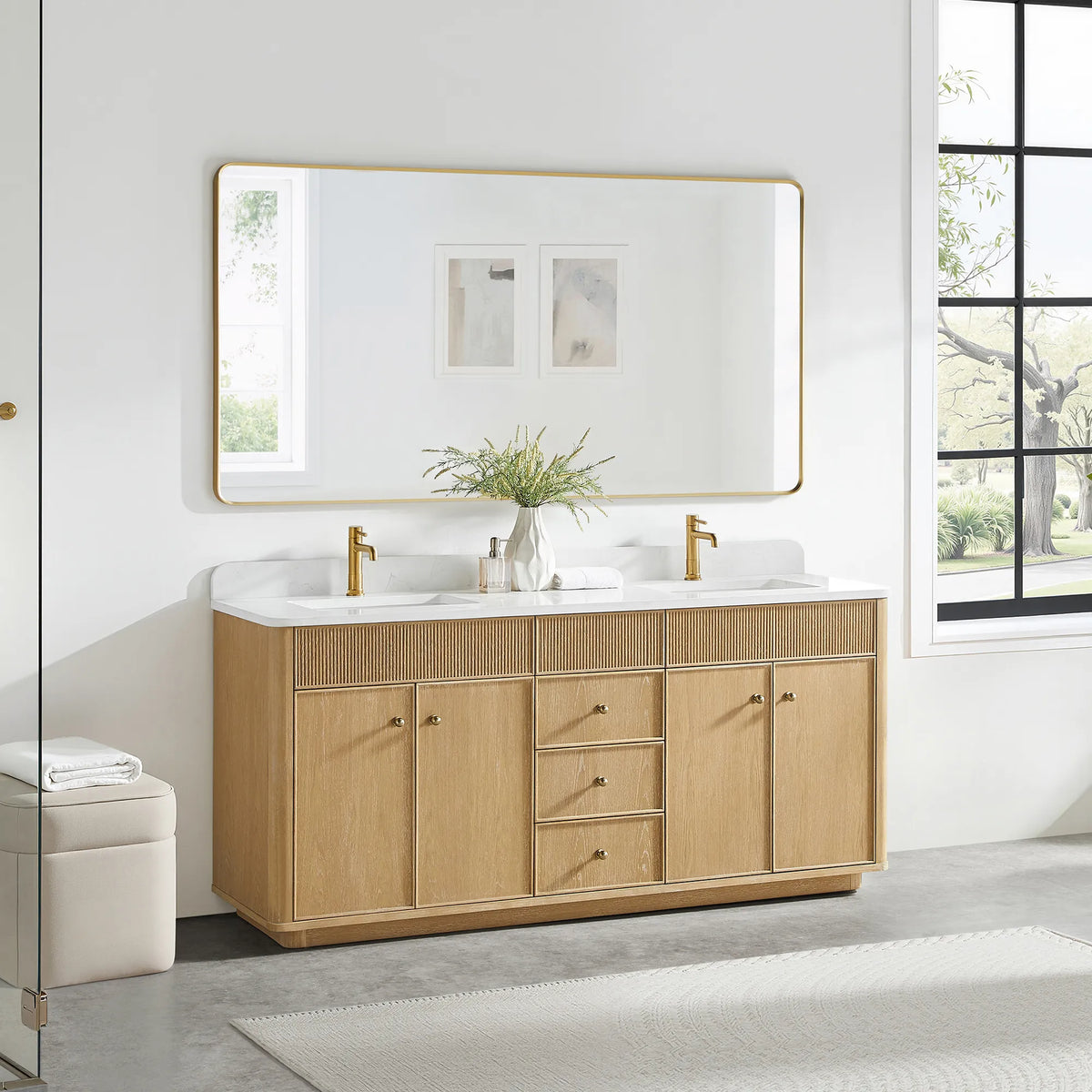 72 inch vanity in Washed Ash Grey with a gold-framed mirror above and a cream stool on a gray floor
