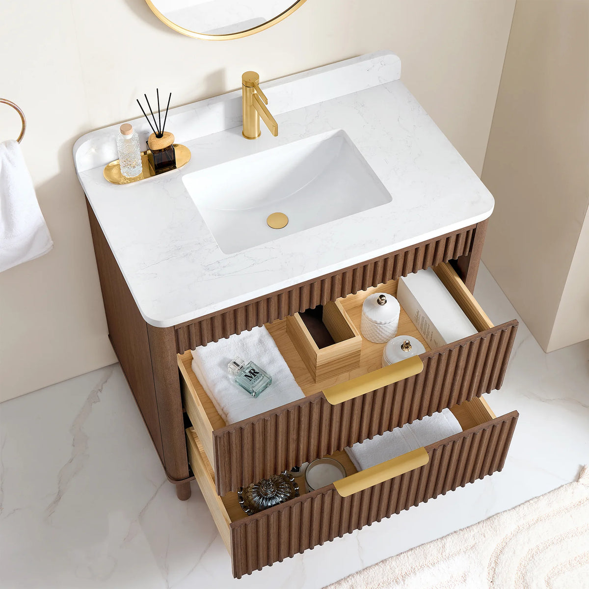 Opened drawers on the 36-inch Aged Dark Brown Oak vanity, a divider box and folded linens in view