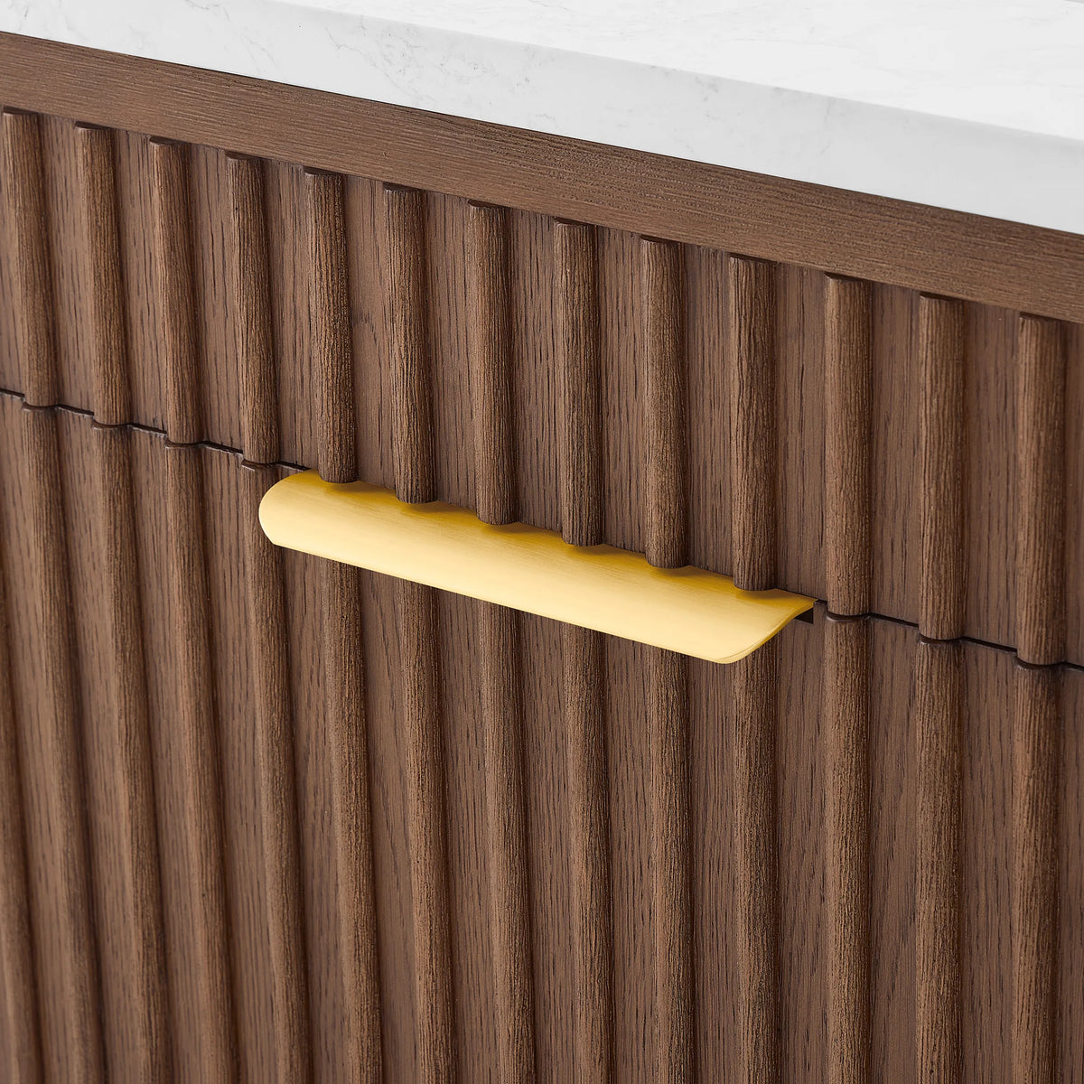 Close detail of a curved gold handle on vertical ribs of Aged Dark Brown Oak, from the 36-inch single vanity