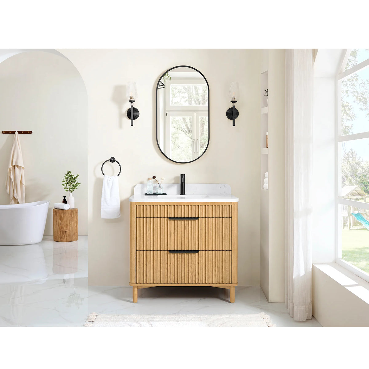 Wide room view of the 36-inch single vanity with black sconces and a ring towel holder, a robe on a hook and a wood stool