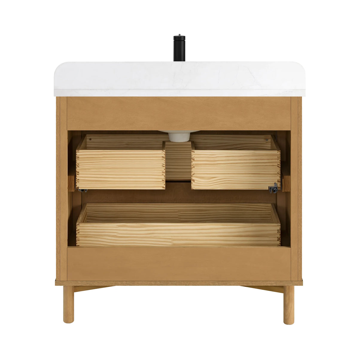 Inside the 36-inch light oak cabinet with drawer fronts out of view: two boxes above a wider one, and the sink drain