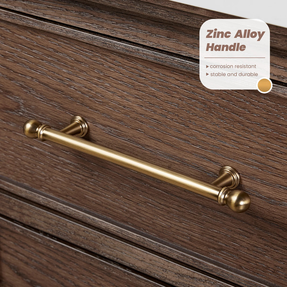 Handle detail: brushed gold bar pull, rounded ends, mounted on drawer wood